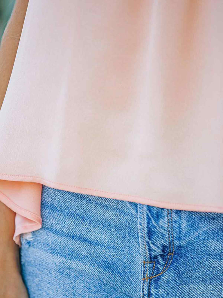 Plain Sleeveless Dip Hem Top